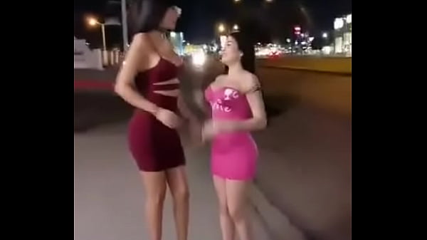 Two whores strip naked in public