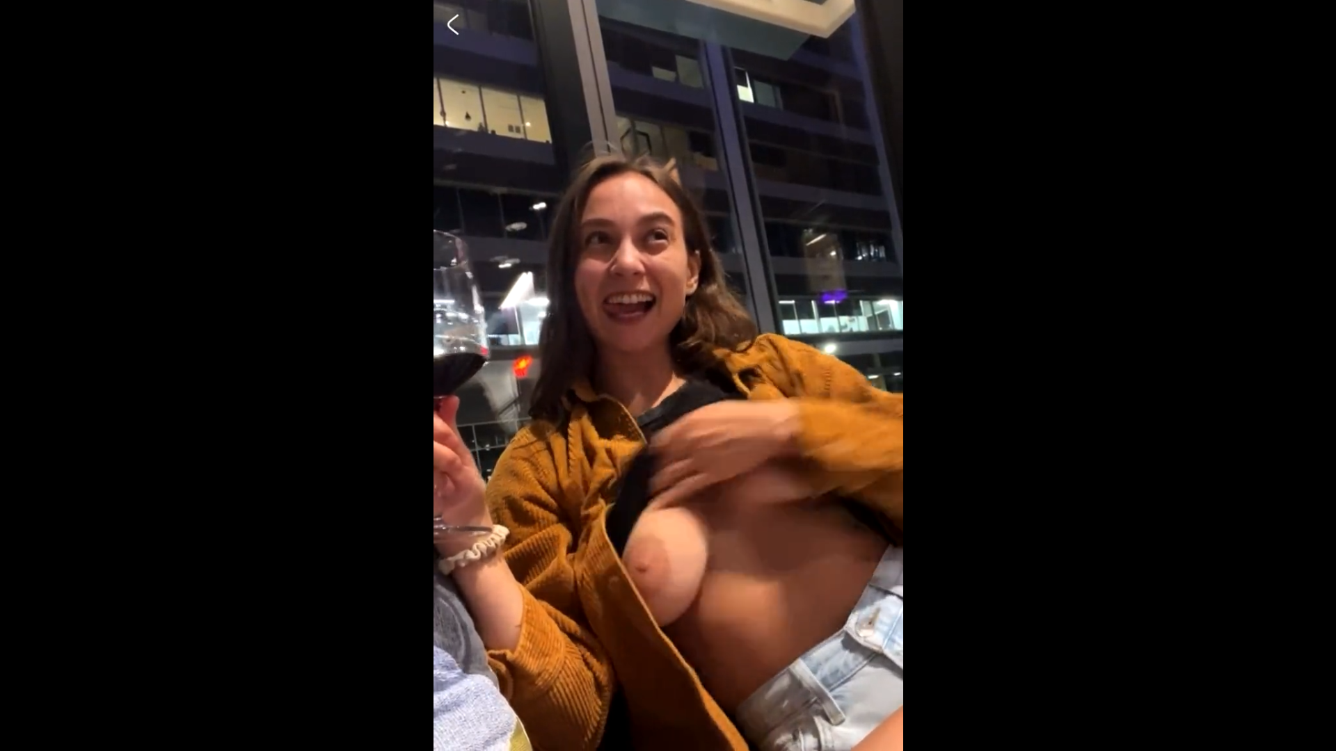milf drinking wine and showing her giant tits