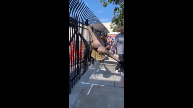 Young girl doing acrobatics in public